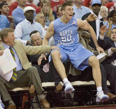 Tyler Hansbrough Sits on Roy Williams