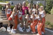 Roy Williams with Hooters Girls